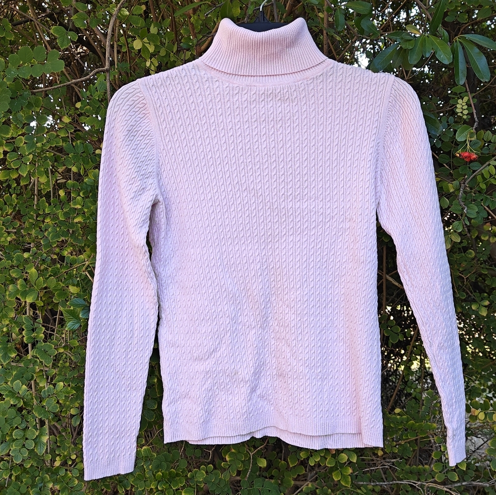 Pink cable knit turtleneck sweater